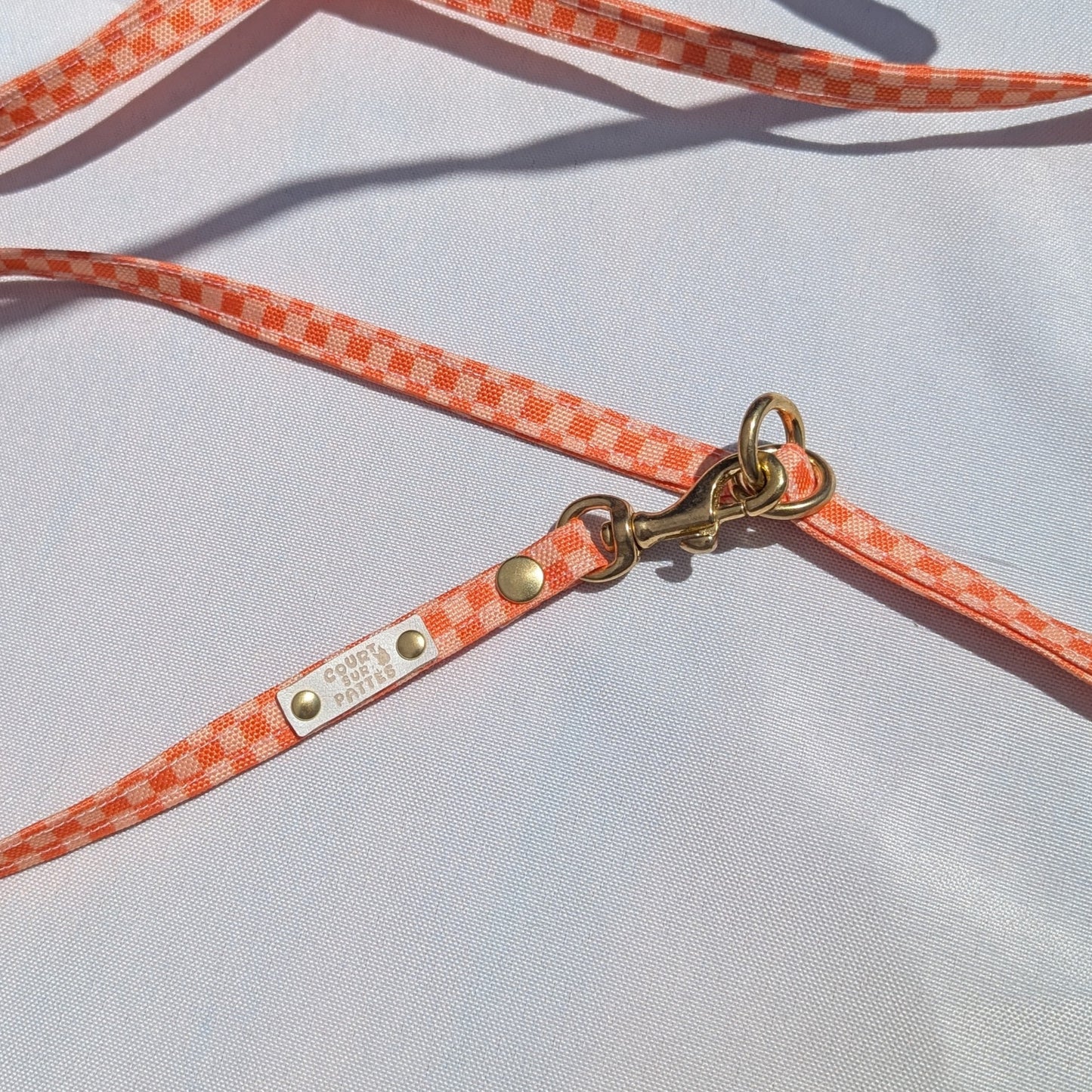 🧡 Laisse Multiposition – Damier Orange